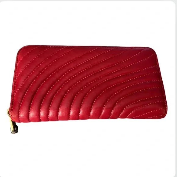 Henri Bendel red quilted wallet with a gold-tone logo. - Picture 2 of 16